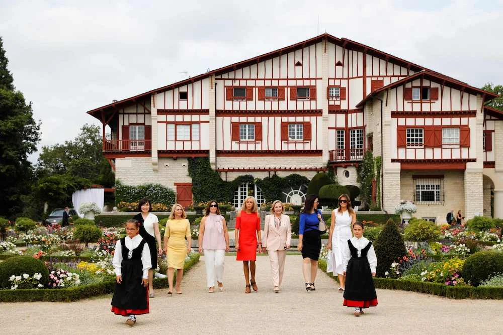 (From L) Japan's Prime Minister's wife Akie Abe, European Council President's wife Malgorzata Tusk, Australia's Prime Minister's wife Jenny Morrison, wife of French President Brigitte Macron, Chile's First Lady Cecilia Morel, President of the World Bank Group's wife Adele Malpass and US First Lady Melania Trump arrive at the Villa Arnaga in Cambo-les-Bains during a visit on traditional Basque culture, near Biarritz as part of the G7 summit, on Aug. 25, 2019. (AFP)