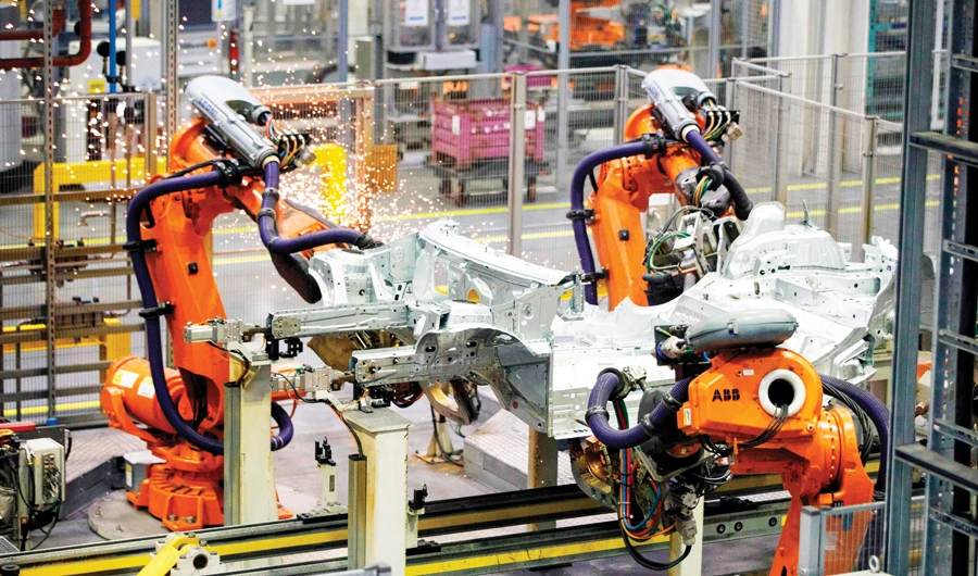 BMW profits hit by higher costs, new tech spending