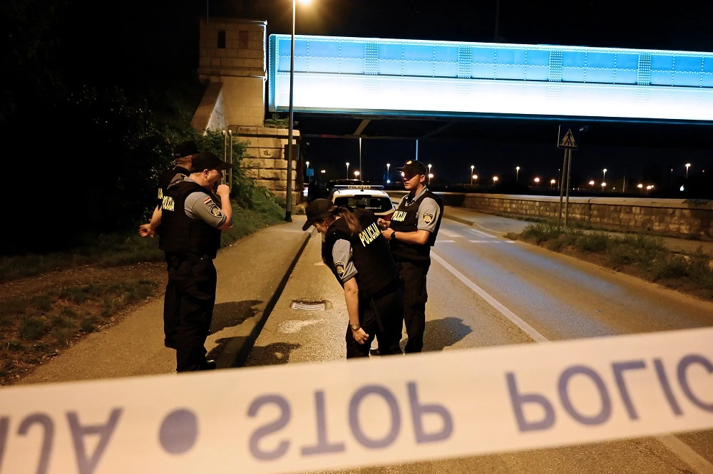 Police officers stand guard at a check point near the place where six people were shoot dead in Zagreb on August 1, 2019. (File/AFP)