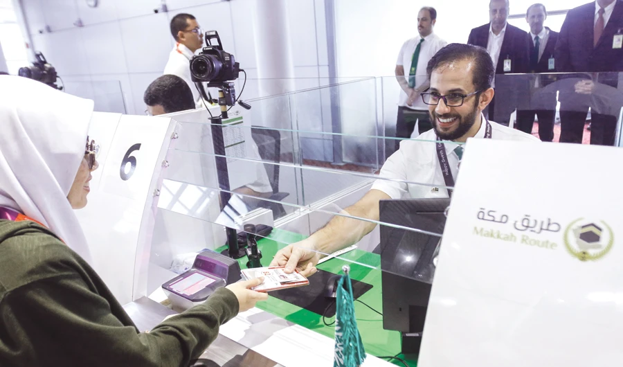 At Kuala Lumpur Airport, pilgrims first enter the Malaysian immigration hall to get their passports processed, then proceed to the Saudi hall for the visa check. The whole process takes about 10 minutes before they are ushered into the waiting hall for boarding. (AN photos by Muhd Fadza Ishak)