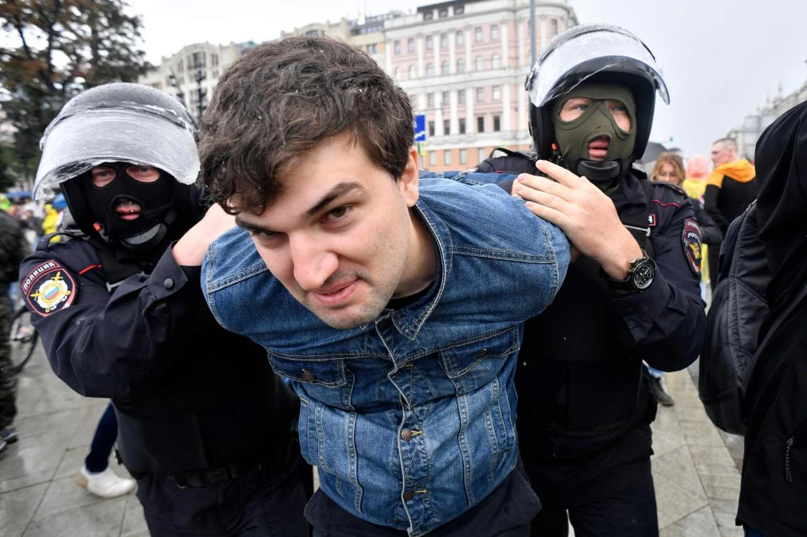 Riot police officers detain a man during an unsanctioned rally urging fair elections at Moscow's Pushkinskaya Square on August 3, 2019.(File/AFP)