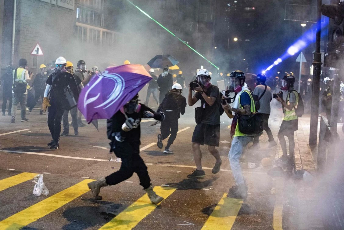 Anti-government protesters in Hong Kong erected barricades in a popular shopping district and blocked a major tunnel on the evening of Aug. 3. (File/AFP)