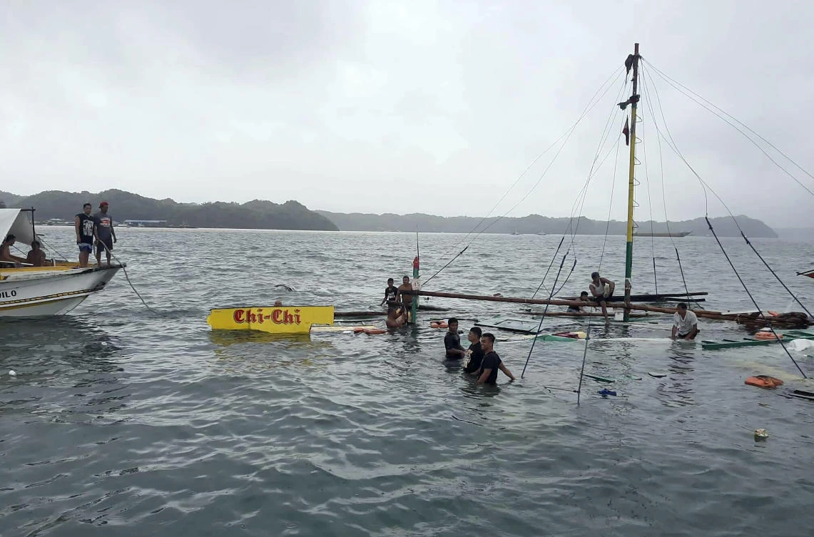 Several people died and 31 others were rescued when three ferry boats separately capsized in bad weather Saturday between two central Philippine island provinces, the coast guard said. (AP)
