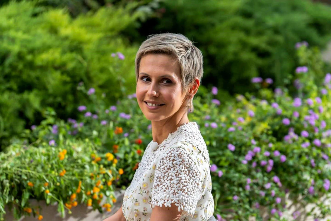 This handout picture released by the Syrian Presidency Facebook page on August 3, 2019, shows First Lady Asma al-Assad posing for a picture. (AFP)