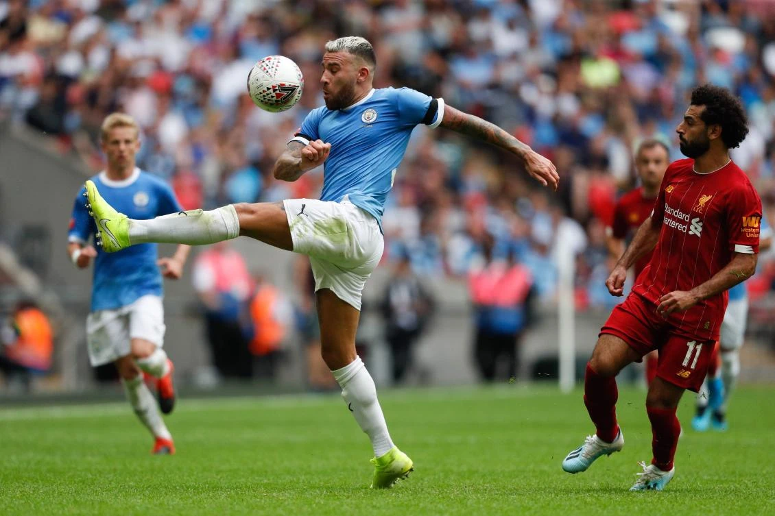 Manchester City's Argentinian defender Nicolas Otamendi controls the ball during the English FA Community Shield football match between Manchester City and Liverpool. (AFP)