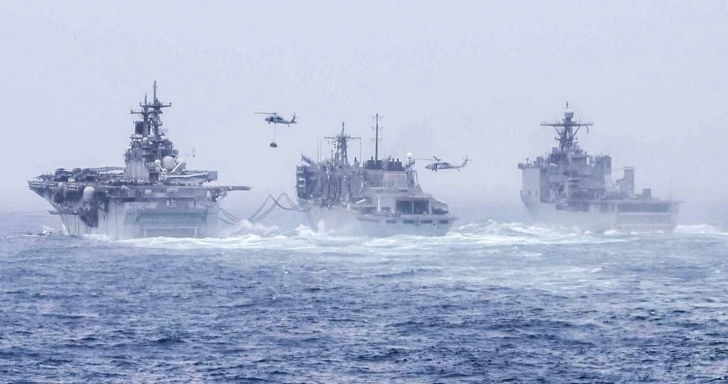 US navy ships conducting a replenishment-at-sea evolution with fast combat support ship in the Arabian Sea. (File/AFP)