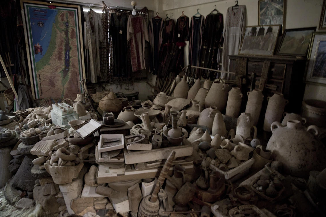 Palestinian heritage pieces and ancient artifacts are piled inside Al-Aqqad private museum in town of Khan Younis, Southern Gaza Strip. (AP)