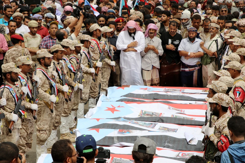 Yemen’s southern separatists pray during a funeral of Brig. Gen. Muneer Al-Yafee and his comrades killed in a Houthi missile attack, in Aden, Yemen, August 7, 2019. (Reuters)