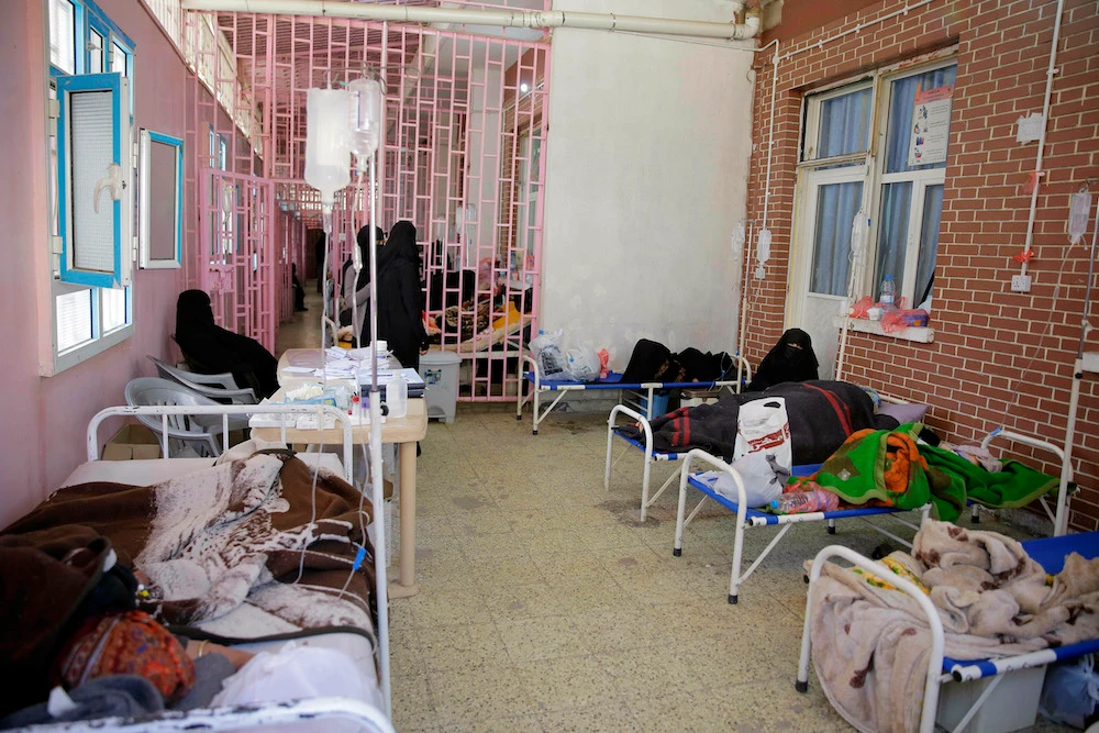 Women are treated for suspected cholera infection at Al-Sabeen hospital, in Sanaa. Some of the UN aid workers sent in to Yemen have been accused of enriching themselves. (AP/File photo)