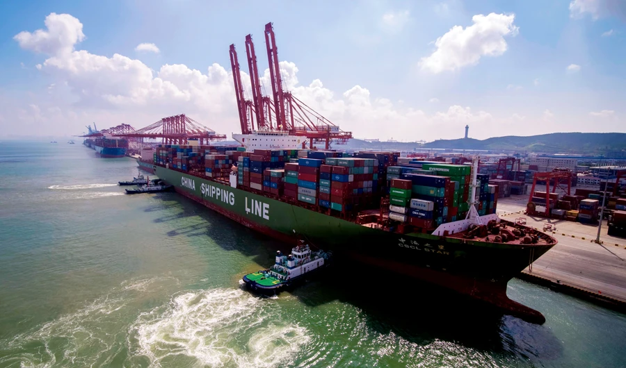 A container ship at a port in Qingdao in eastern China’s Shandong province. Chinese imports of American goods plunged in July as a tariff war with Washington intensified. (AP)
