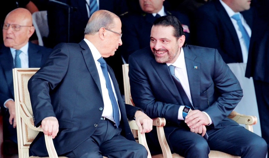 Lebanese PM Saad Hariri, right, meets with President Michel Aoun to discuss political crisis. (Reuters/File)