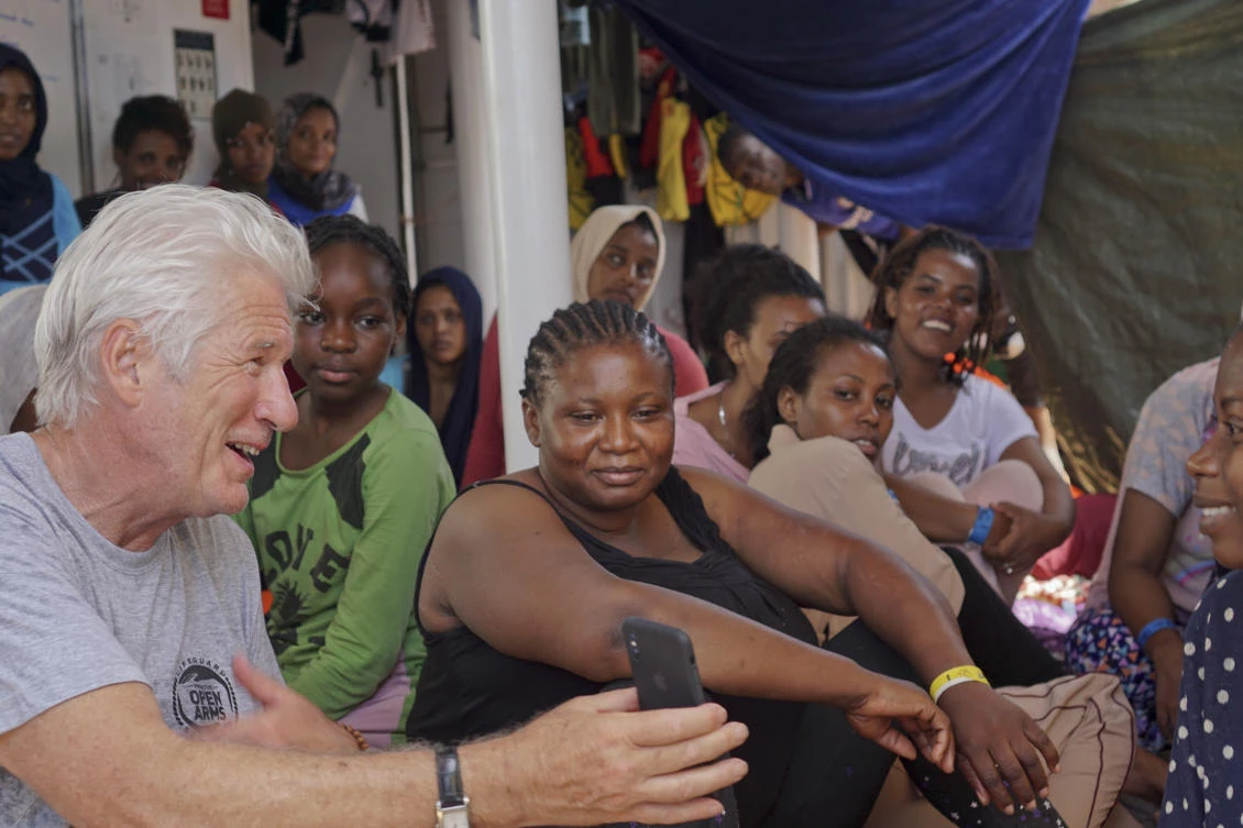 Richard Gere visits migrants stuck at sea in Mediterranean
