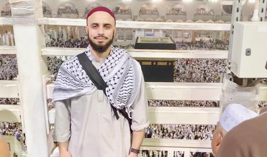 Majd Kattan, from Dearborn, Michigan, poses for a photo in the Grand Mosque in Makkah. (AN photo by Laila Alhusini)