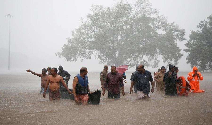 India floods kill nearly 100, thousands evacuated