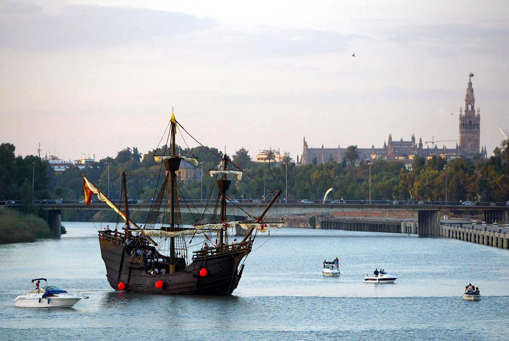 In this file photo taken on October 12, 2004 a replica model of Portuguese explorer Ferdinand Magellan's 16th century carrack Victoria leaves Sevilla, Spain. (AFP / Cristina Quicle)