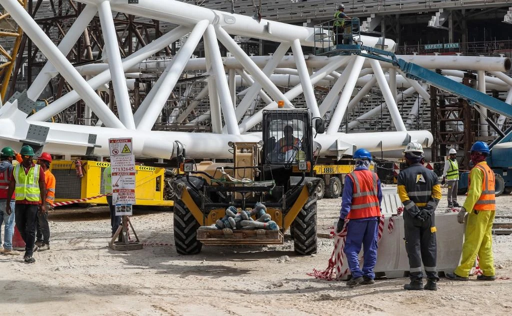 Hundreds of migrant workers strike in Qatar over working conditions
