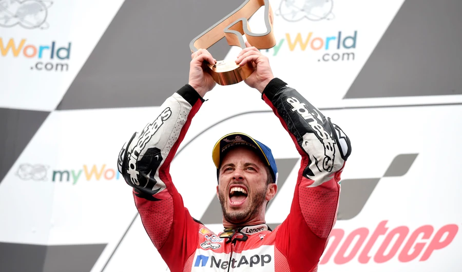 Mission Winnow Ducati’s Italian rider Andrea Dovizioso celebrates his victory. (AFP)