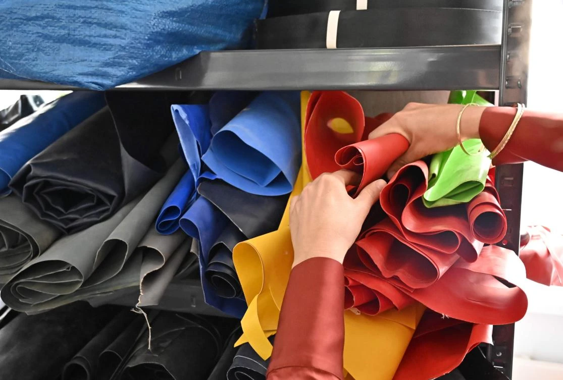 Vera Guenther, co-founder of the small Berlin-based company ‘Mimycri’, looks at plastic pieces at Mimycri’s workshop. (AFP)