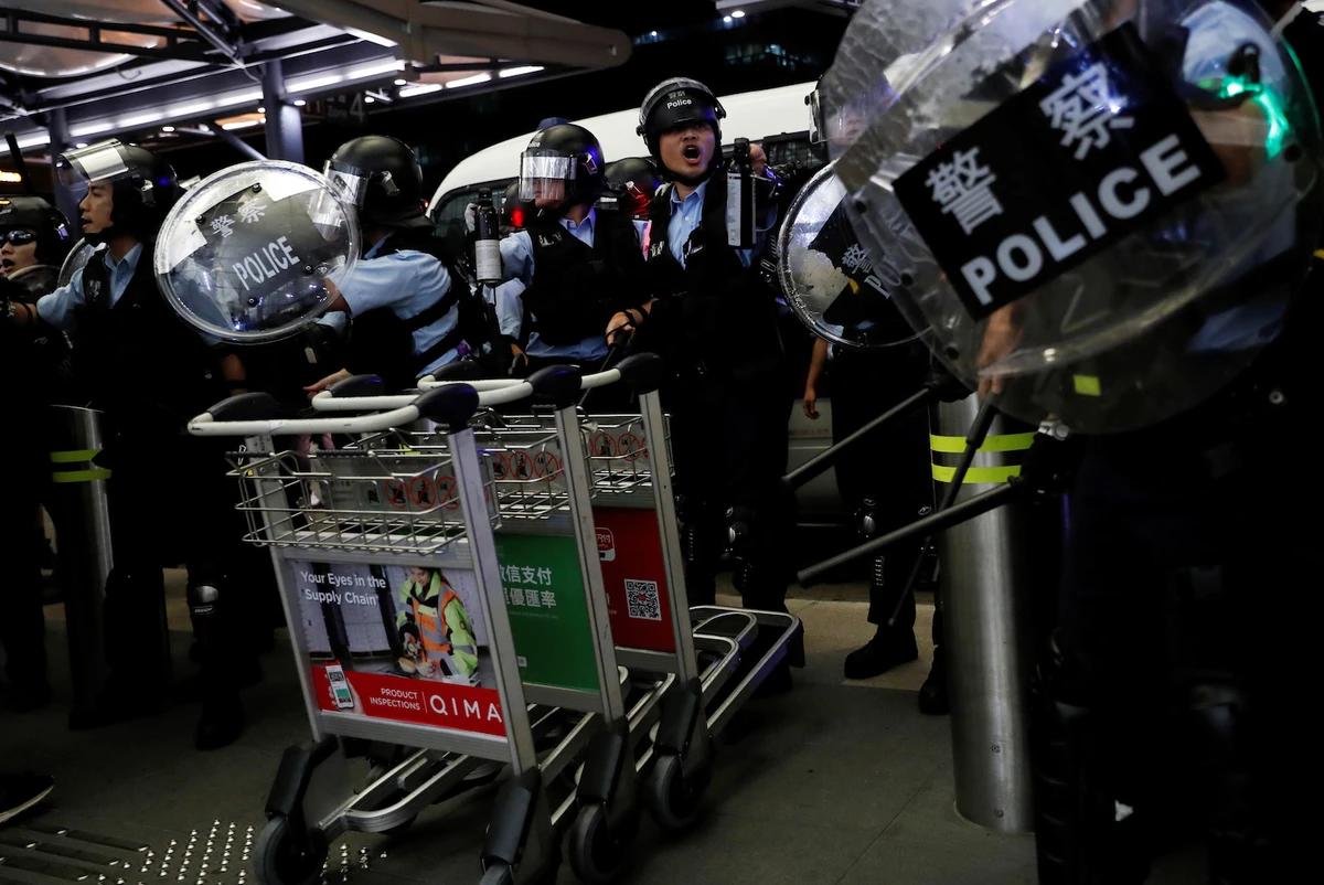 Clashes at Hong Kong airport; UN urges restraint over protests