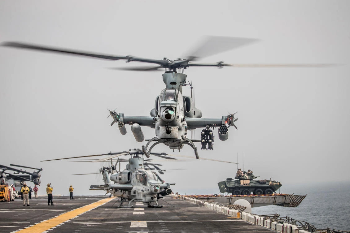 Helicopters aboard the amphibious assault ship USS Boxer in the Strait of Hormuz. The US has called for a coalition to protect shipping in the region. (US Navy via Reuters)