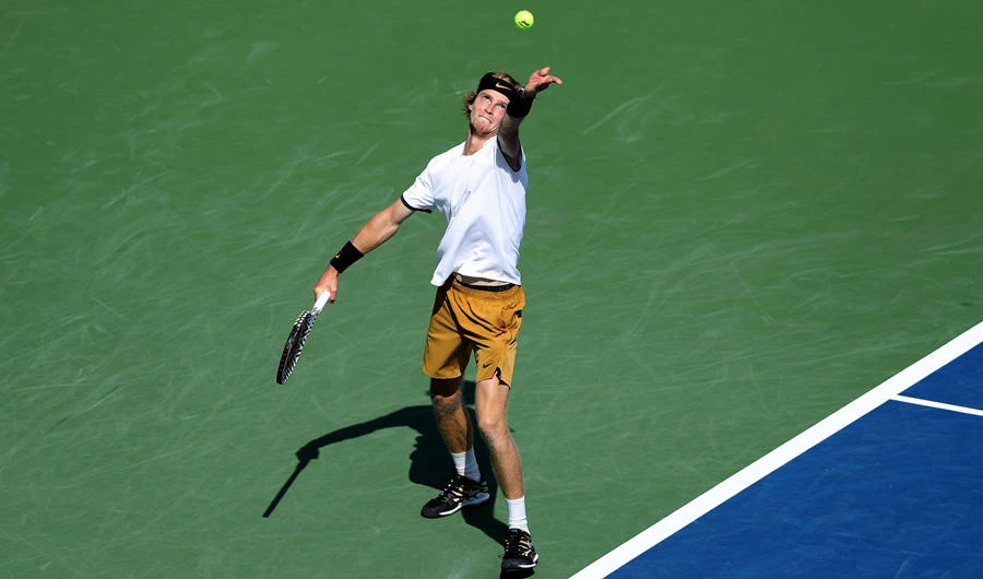 Andrey Rublev of Russia serves to Roger Federer of Switzerland during Day 6 of the Western and Southern Open at Lindner Family Tennis Center on August 15, 2019 in Mason, Ohio. (Rob Carr/Getty Images/AFP)