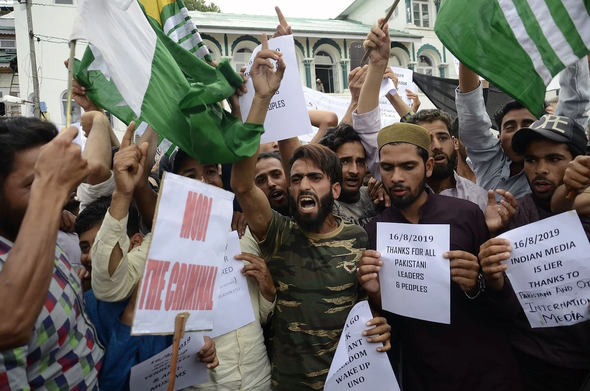 Protesters shout slogans at a rally against the Indian government's move to strip Jammu and Kashmir of its autonomy and impose a communications blackout, in Srinagar on August 16, 2019. (AFP)