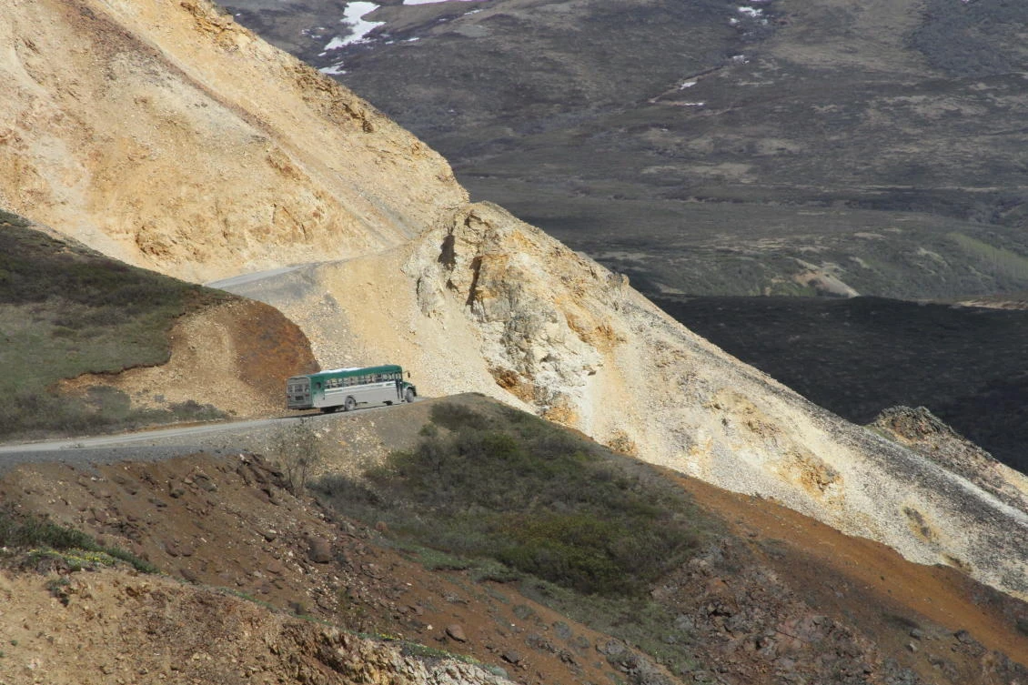 Above, a tourist bus near Polychome Pass on the only road inside Denali National Park and Preserve, Alaska in this 27, 2016 photo. (AP)