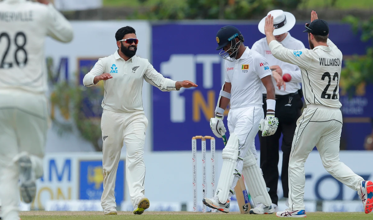 New Zealand's bowler Ajaz Patel, left, celebrates the dismissal of Sri Lanka's Lahiru Thirimanne. (AP)