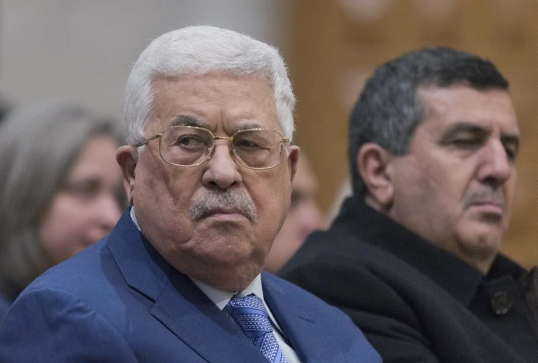 Palestinian president Mahmoud Abbas has fired all of his advisers, amid a financial crisis in the occupied West Bank. (File /AFP)