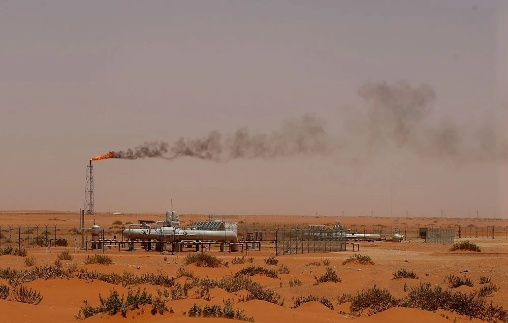 A flame from a Saudi Aramco oil installation known as "Pump 3" is seen in the desert near the oil-rich area of Khurais, 160 kms east of the Saudi capital Riyadh. (File/AFP)