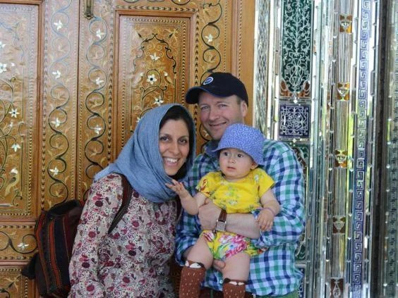 Iranian-British aid worker Nazanin Zaghari-Ratcliffe is seen with her husband Richard Ratcliffe and her daughter Gabriella in an undated photograph handed out by her family. (Reuters)