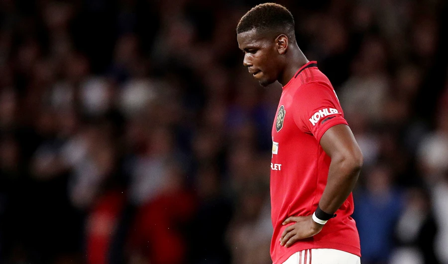 Manchester United’s Paul Pogba reacts after his penalty is saved by Wolverhampton Wanderers’ Rui Patricio during their match on Monday. (Reuters)