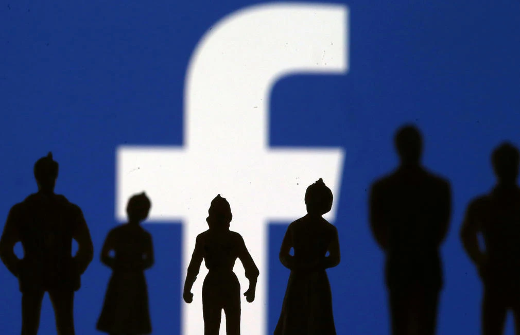 Small toy figures are seen in front of Facebook logo in this illustration picture on April 8, 2019. (REUTERS/Dado Ruvic/Illustration/File Photo)