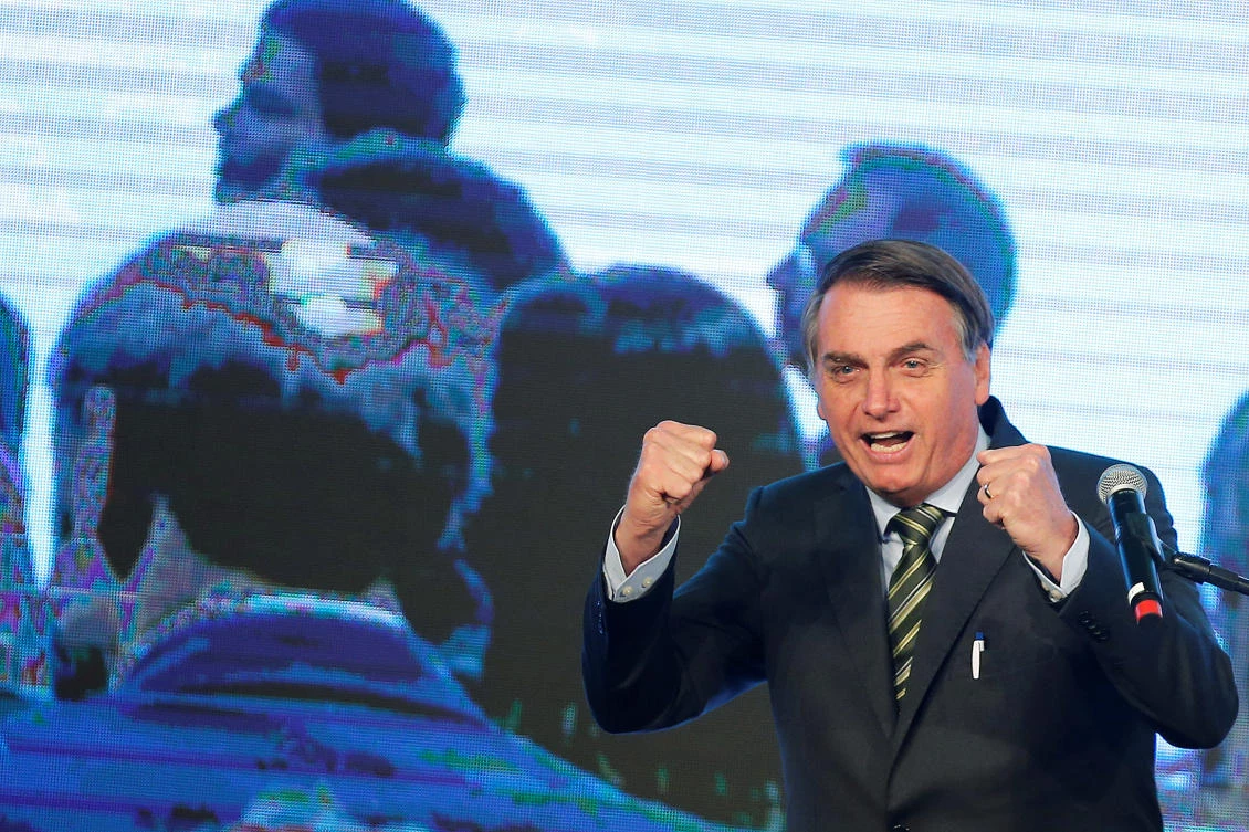 Brazil’s President Jair Bolsonaro said ‘criminal action by those NGOs, to call attention against me, against the Brazilian government’ following funding cuts may be the reason for the forest fires. (Reuters)