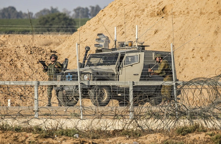 The Palestinian was shot as they attempted to cross the border from Gaza after throwing a grenade (File/AFP)