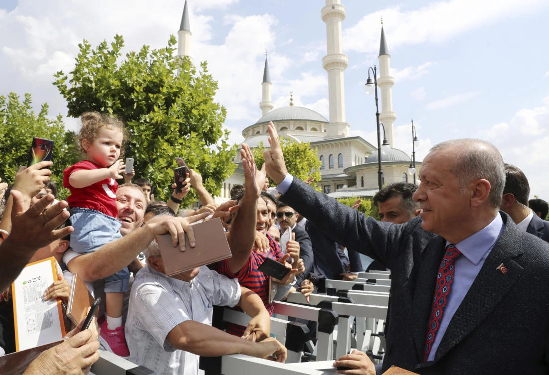Turkey’s President Recep Tayyip Erdogan speaks to his supporters after Friday prayers, in Ankara. Erdogan discussed the situation in Syria with Russia’s Vladimir Putin, telling his Russian counterpart that violations of the cease fire in Idlib is paving the way to a ‘humanitarian crisis.’ (AP Photo)