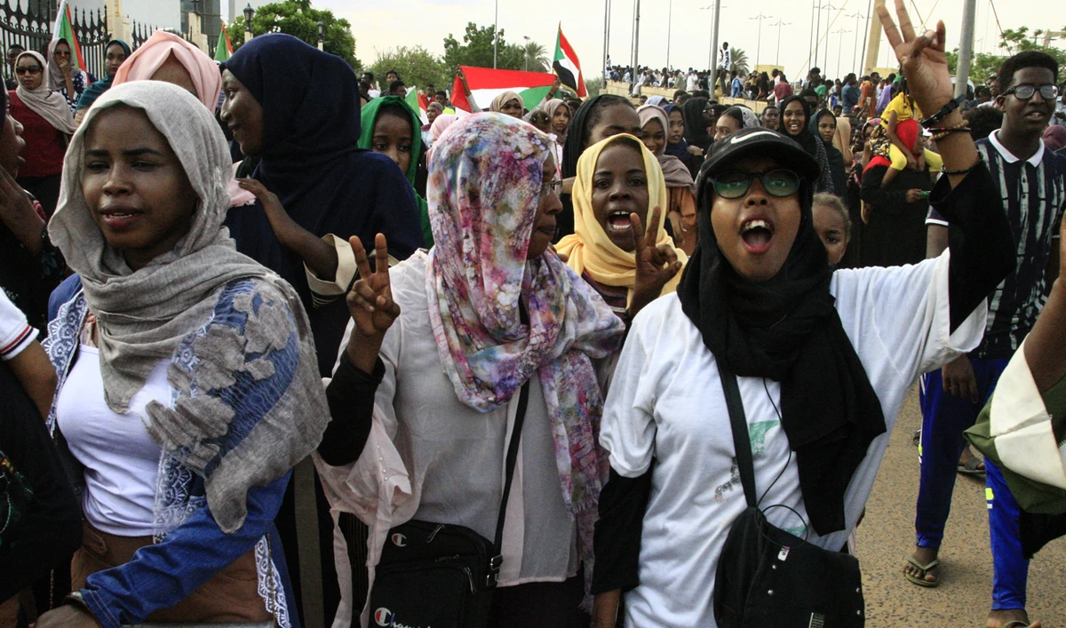 “Women were the dynamo of this revolution, they can’t be taken out of the picture. Otherwise there will be another revolution.” (AFP)