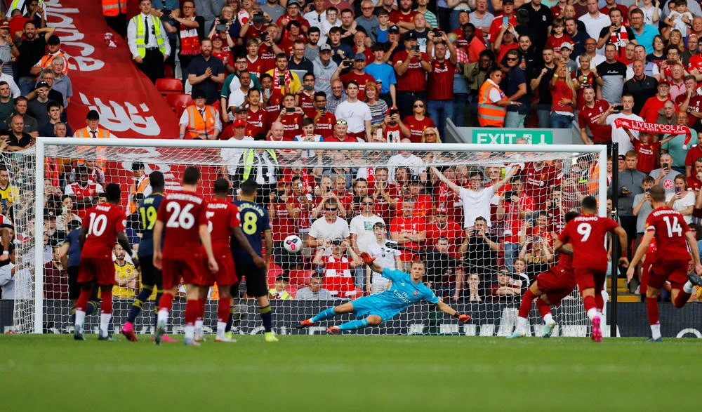 Mohamed Salah scores Liverpool's second goal from the penalty spot, leading his team to a 3-1 victory over Arsenal 3-1 on August 24, 2019. (REUTERS/Phil Noble)