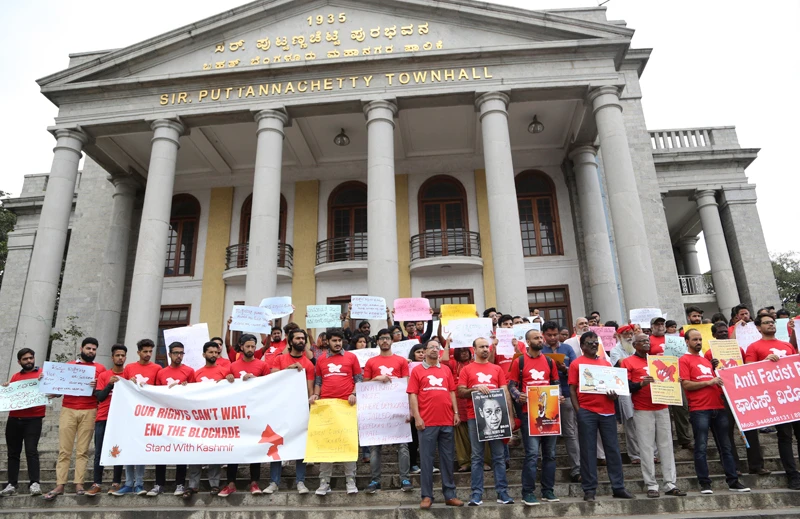 Kashmiris living in Bangalore protest on Aug. 24, 2019 to seek an end to the communication blockade in Indian-controlled Kashmir. (AP Photo/Aijaz Rahi)