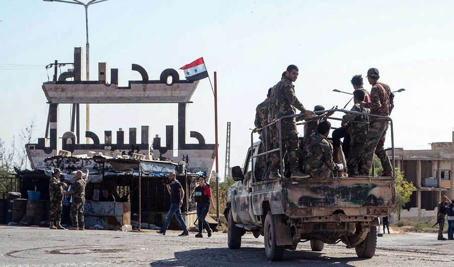 Family stayed in Syrian town during offensive as fighters ousted