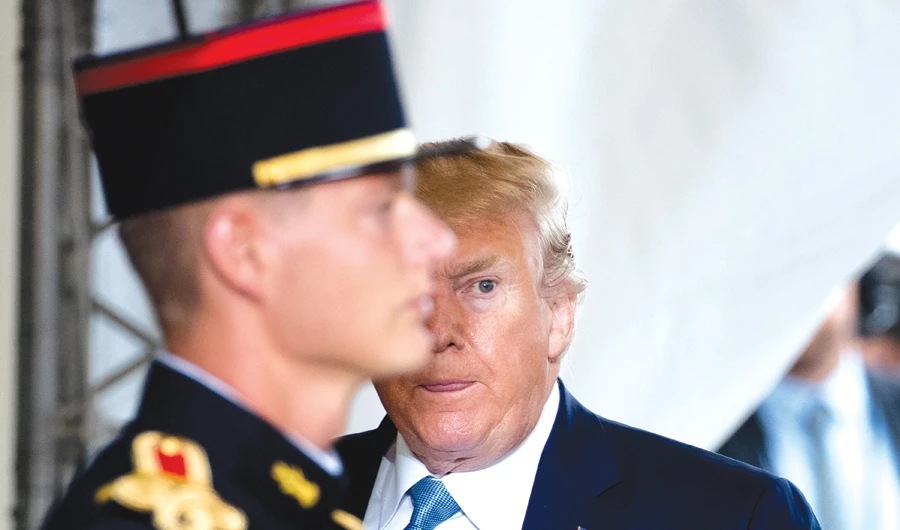 US President Donald Trump arrives at the G7 summit in Biarritz, France, on Sunday. Trump had been trying to use the conference to rally global leaders to do more to stimulate their economies, as fears rise of a potential slowdown in the US ahead of his reelection. (AP)