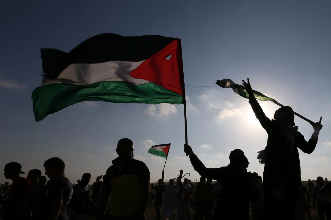Palestinians take part in an-anti Israel protest at the Israel-Gaza border fence in the southern Gaza Strip August 23, 2019. (Reuters)