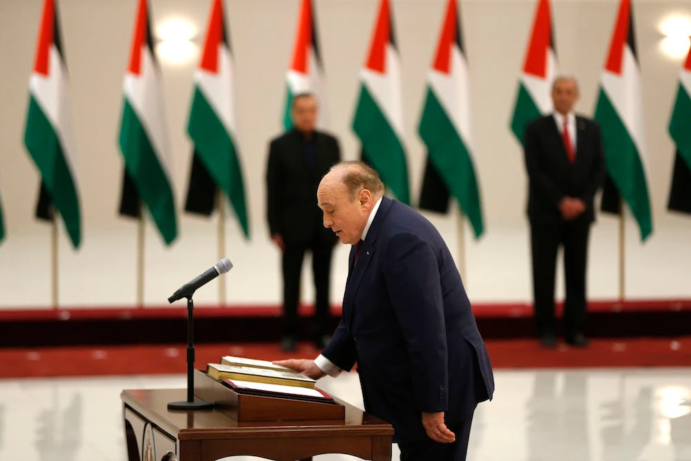Shukri Bishara is sworn in as finance minister in the new Palestinian government, in the Israeli-occupied West Bank town of Ramallah, on April 13, 2019. (File/AFP)