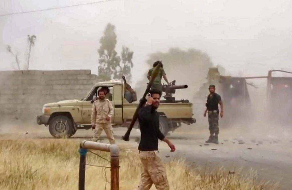 Libyan self-styled army pushes to take key town near Tripoli