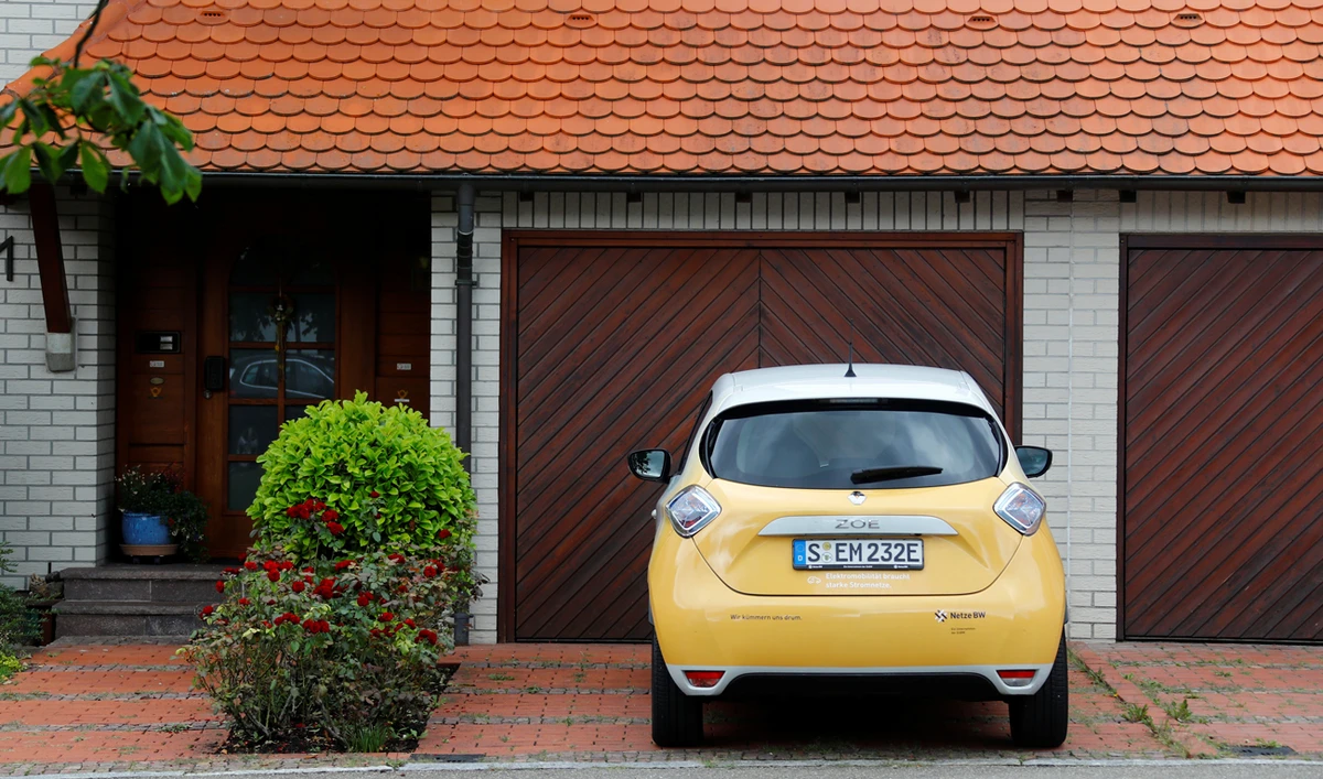 More data exchange between cars and grids needed. (Reuters)
