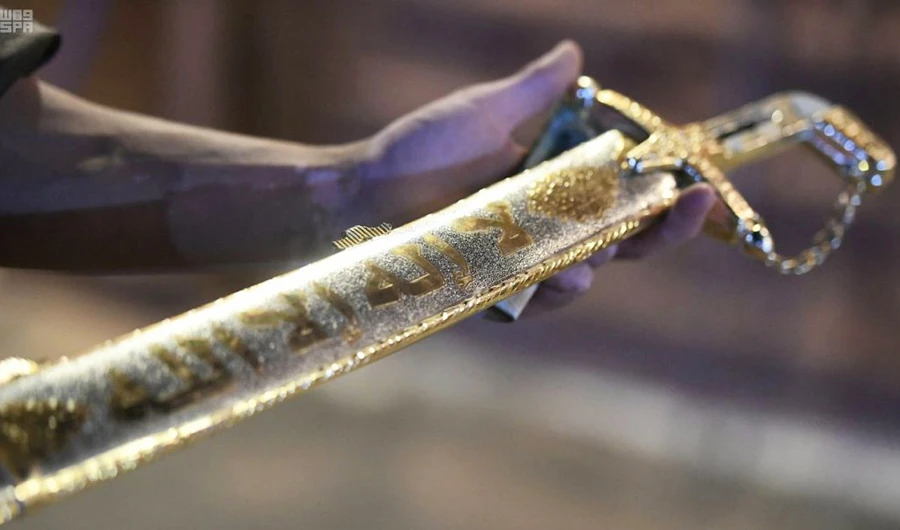 Swords and daggers on display wow visitors at Souk Okaz