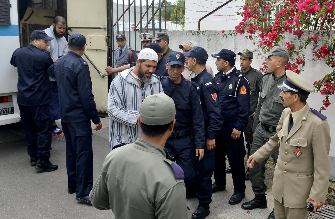In this file photo taken on May 02, 2019, suspects in the murder of two Scandinavian hikers, arrive for their trial at a Moroccan court in Sale near the capital Rabat. (AFP)