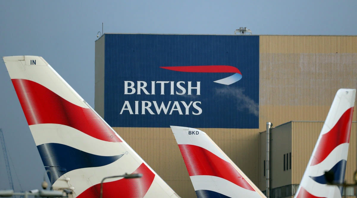 British Airways logos are seen on tail fins at Heathrow Airport in west London in 2018. The airport is set to be a target for drone-flying climate change activists. (Reuters)