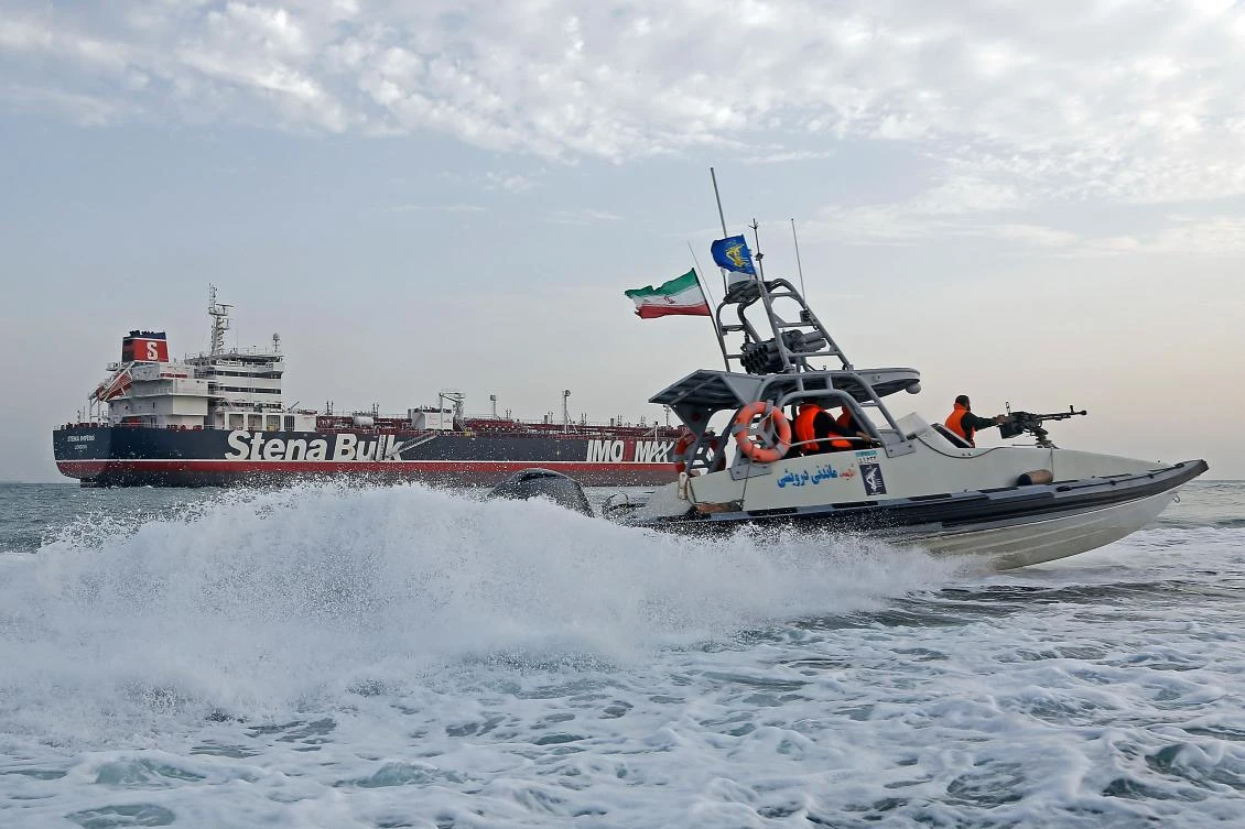 Iranian Revolutionary Guards patrol around the British-flagged tanker Stena Impero as it's anchored off the Iranian port city of Bandar Abbas. (File/AFP)