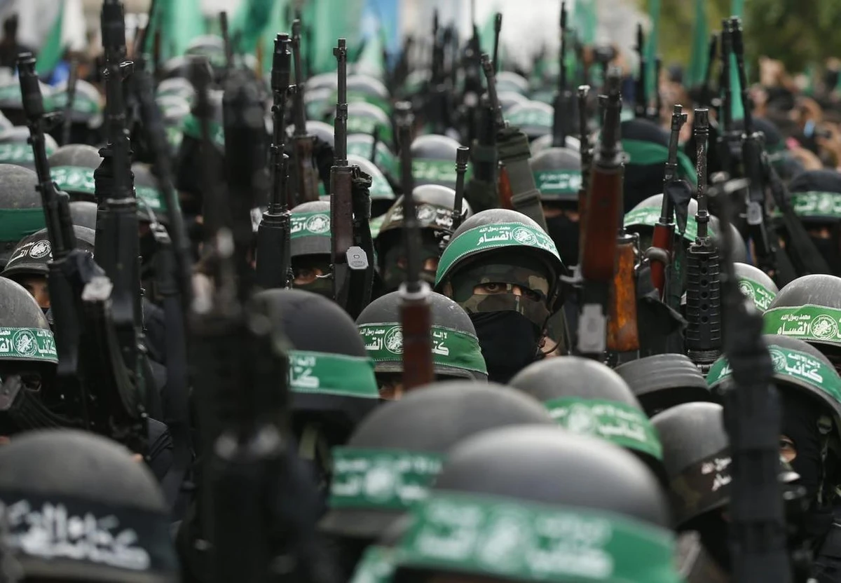 Palestinian members of al-Qassam Brigades, the armed wing of the Hamas movement, take part in a military parade marking the 27th anniversary of Hamas' founding, in Gaza City December 14, 2014. (Reuters)